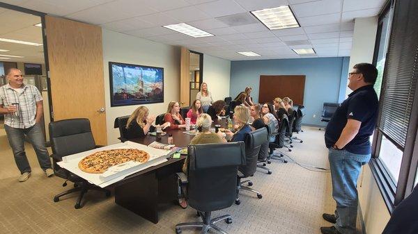 Giant Pizza lunch party in the office