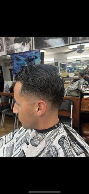 Low skin fade super drop in the back