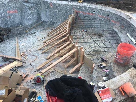 Constructing a large cabo sun deck.