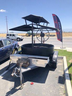 BBQ trailer out front. Smells good!