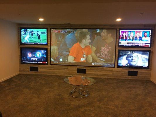 4 tvs recessed in-wall, 139" projector screen, and 3 in-wall speakers