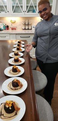 Executive Chef Queen showing off an Indulgent Dessert