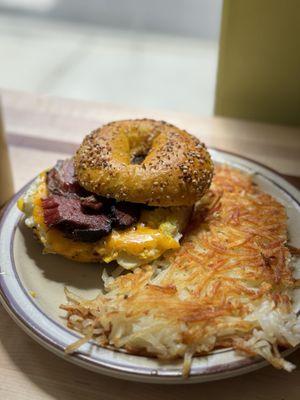 Pastrami breakfast in a everything bagel.