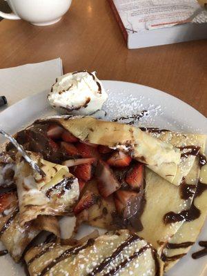 The berry crepe is bursting with fresh berries