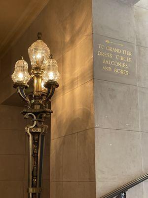 Directions on stairs are placed at the beginning in gold carved signs