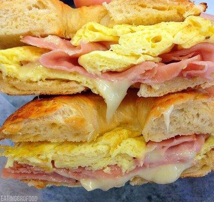 Asiago bagel toasted with cheese, ham and real eggs