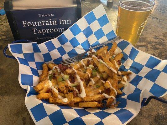 Cold beer and loaded fries.