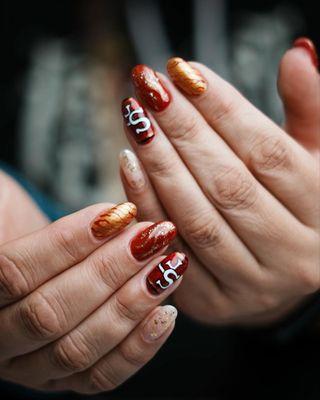 Bay area 49ers nail design with gold red and glitter!