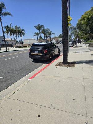 Sheriff illegally parked when there's tons of parking available.