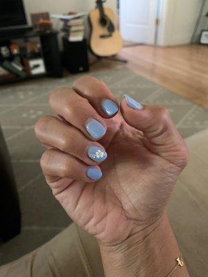 Blue gel nails with a flower! This is already a week or so in my nails are growing out.