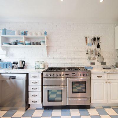 A very clean gas range or kitchen stove.