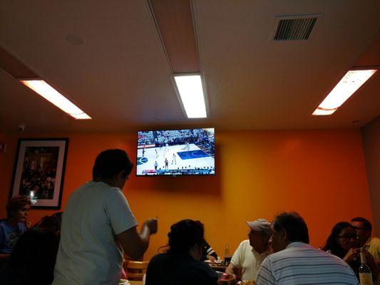 They have a TV with NBA playoffs on!