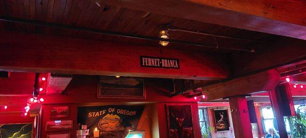 Fernet Branca street sign and Rainier beer memorabilia