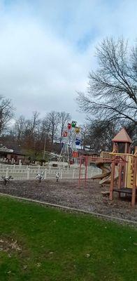 Ferris wheel and playground equipment