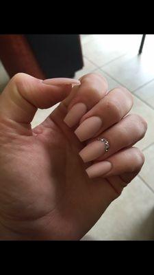 Nude coffin style Acrylic nails with a hint of bling