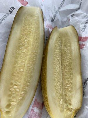 Tasty pickle split into 4's