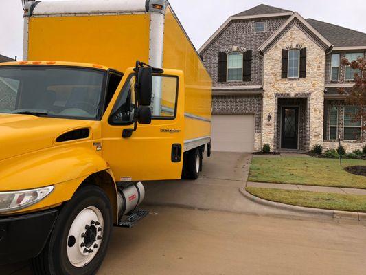 Unloading moving truck in Rockwall, Texas