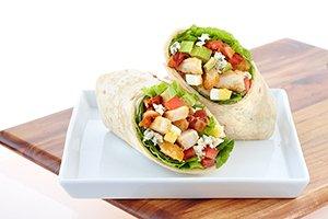 COBB WRAP: chopped romaine & iceberg blend, breaded chicken, crispy bacon, tomatoes, avocado, chopped eggs, abnd bleu cheese.