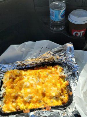 scrambled egg, cheese bowl with sausage gravy added heated in convection oven coffee.