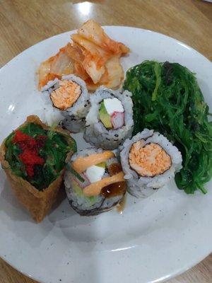 Delicious selection of sushi, kimchi and delicious seaweed dish from great hibachi grill!