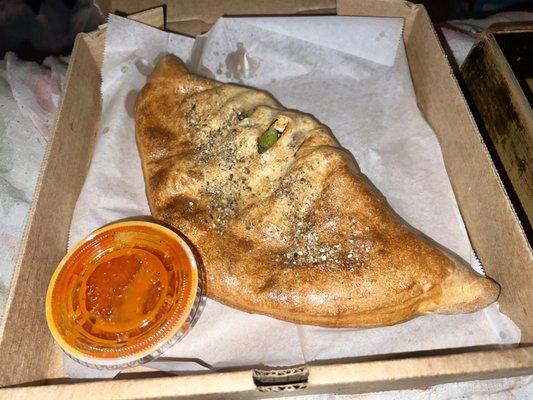 Cheese Calzone with Chicken, Peppers, Black Olives, Mushrooms