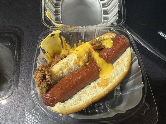 $14 (including 20% tip) for 2 of these.  The chili and cheese are supposed to be ON the fucking hotdog.