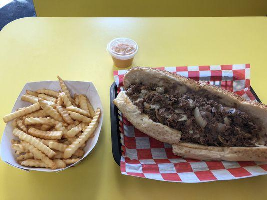 French fries and Cheesesteak.