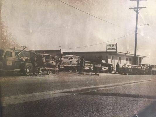 Here is a pic from the early 70's of the Green's service men, their trucks and the office.