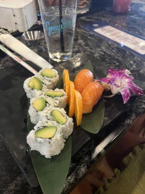 Avocado roll and salmon nigiri