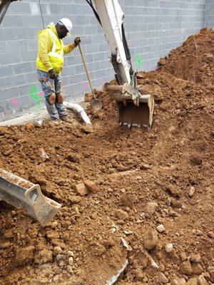 Underground plumbing at new apartment building