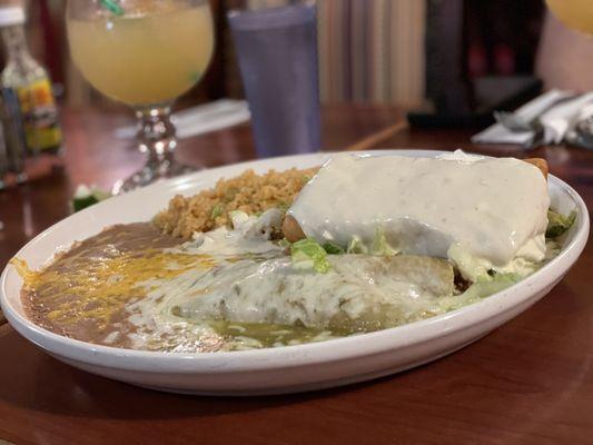 Seafood chimichanga with crema sauce, enchilada verde.