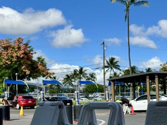 After drive-thru wipe down station and vacuum stalls