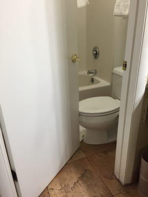 Door hitting the toilet in the bathroom