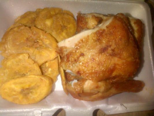 fried half chicken and yellow plantains from foo-hing restaurant.