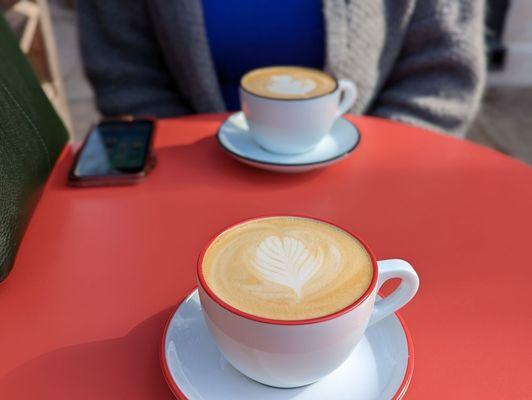 Bourbon caramel latte for her, dirty chai for me