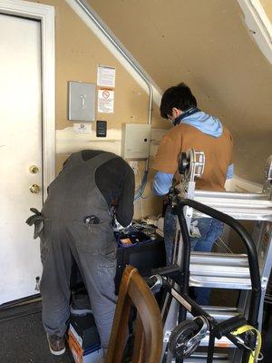 ioT team making up Ethernet cables at the ISP end