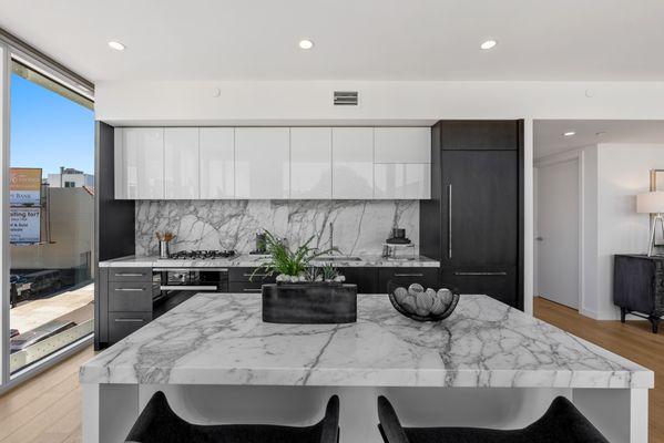 Kitchen with elegant marble countertops and backsplash| Ruth Krishnan, Realtor | #2 SF Agent for unit sales in 2023 (per MLS)