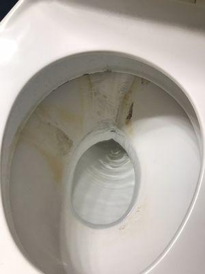 Toilet was this dirty upon move in. No amount of cleaning will fix it. Filthy