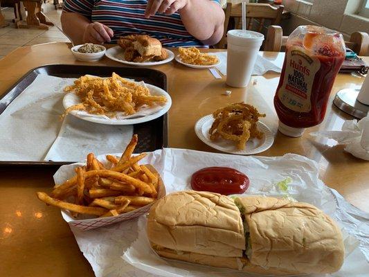 Fried chicken, onion rings, fries, shrimp poboy.