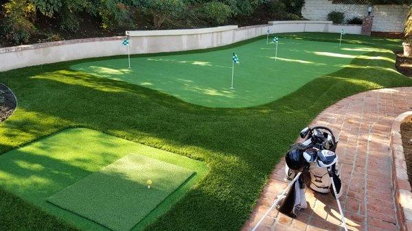 Backyard putting green designed and installed by Elite.