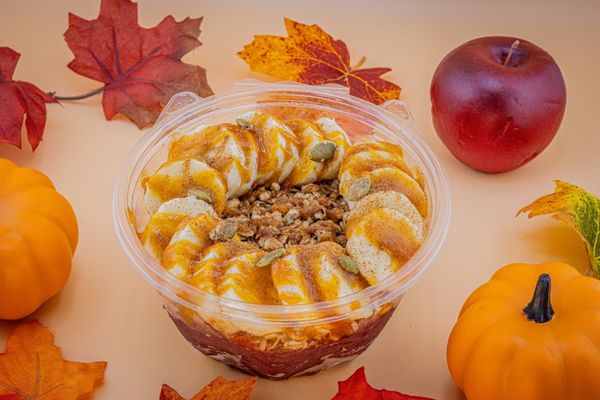 Pumpkin fest smoothie bowl. Açaí base topped with pumpkin seeds-granola, bananas, pumpkin butter and pumpkin pie spice