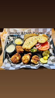 Grilled grouper sandwich with the "Spectacular " Hush puppies " as my side!!!