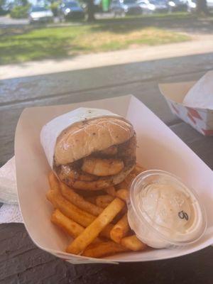 Seafood sandwich and fries.