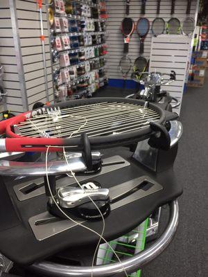 Ability to have 2 full time tennis racket restringers working at a time, $15 labor cost