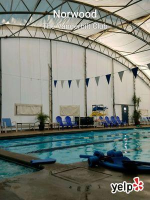 The pool, with the cover in place during colder months. You can see the hot tub at the bottom left corner.