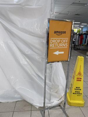 Inside: Amazon drop off signage in front of construction on the new dedicated Sephora section