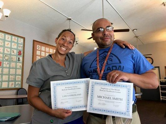 Long-time staff members  Laska Strickland, CNA and Mike Smith, Restorative Aide, winning Employee of the Month & Resident's Choice,July 2018