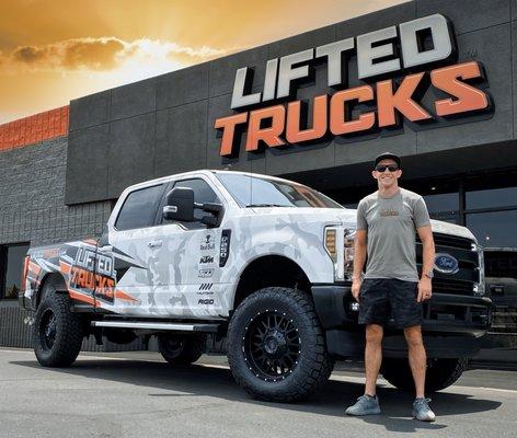 Professional motorcycle racer, Taylor Robert with his custom built F-250 from Lifted Trucks