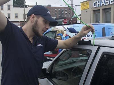 Daniel opening car door