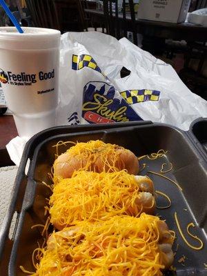 Combo #3: 3 cheese coneys with mustard, onion, and hot sauce, with a cold Pepsi